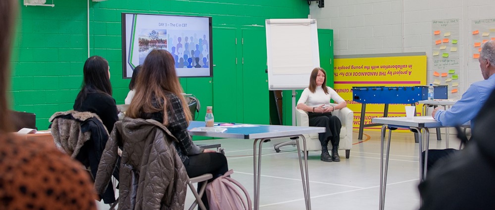 Practitioner leading a session